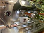 Coffee cup on an espresso machine.