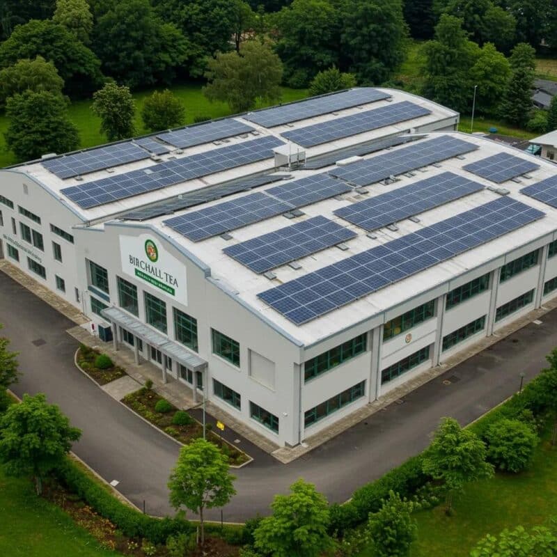 Birchall Tea's solar-powered factory, showcasing its commitment to sustainability with visible solar panels on the roof.