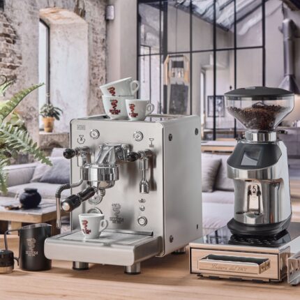 Elegant coffee machine and grinder in stylish kitchen.