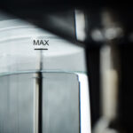 Close-up of a water container's maximum fill line.