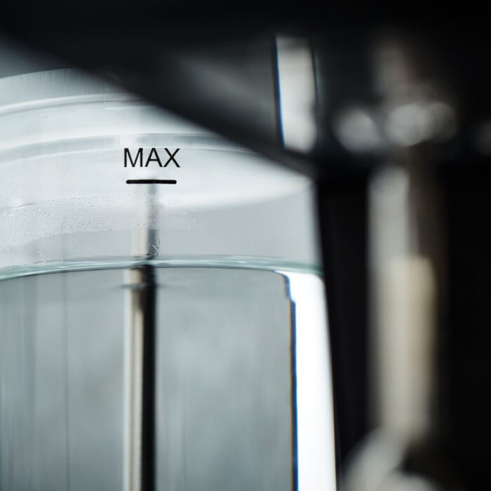 Close-up of a water container's maximum fill line.