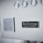 Close-up of a Bellezza coffee machine controls.