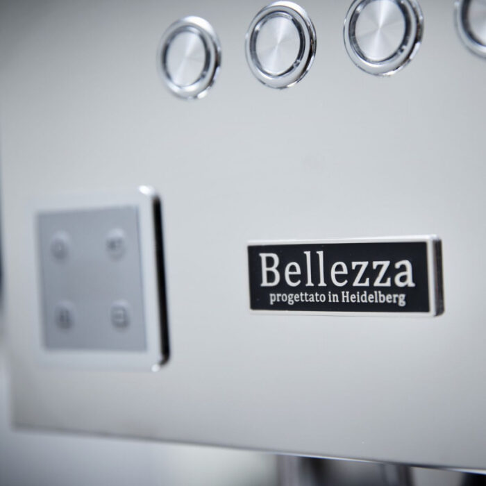 Close-up of a Bellezza coffee machine controls.