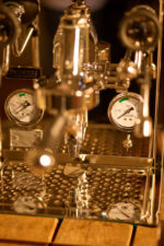 Close-up of a shiny espresso machine.