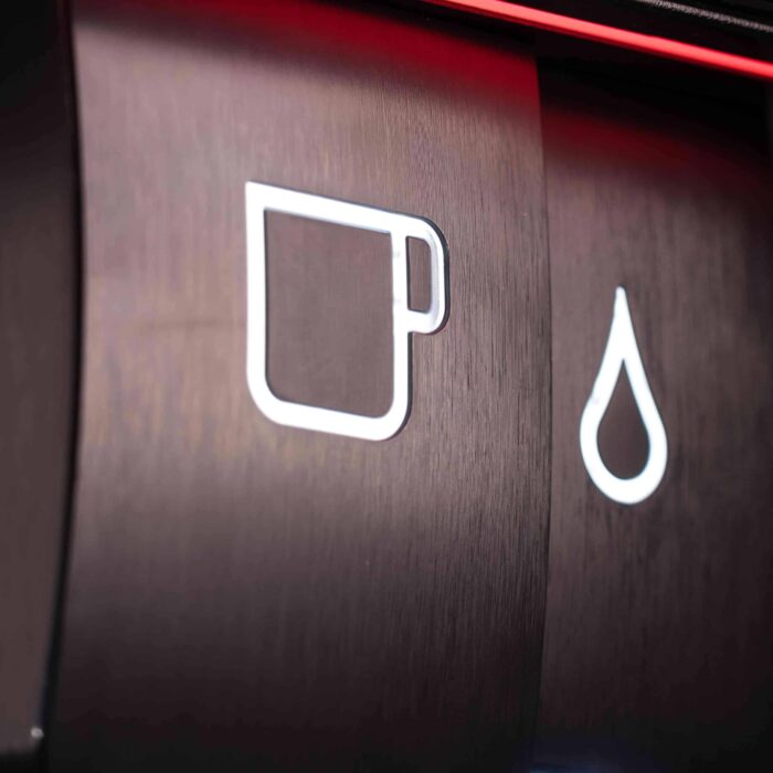 Symbols for cup and water on appliance
